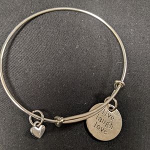 Expandable bracelet with live love laugh message